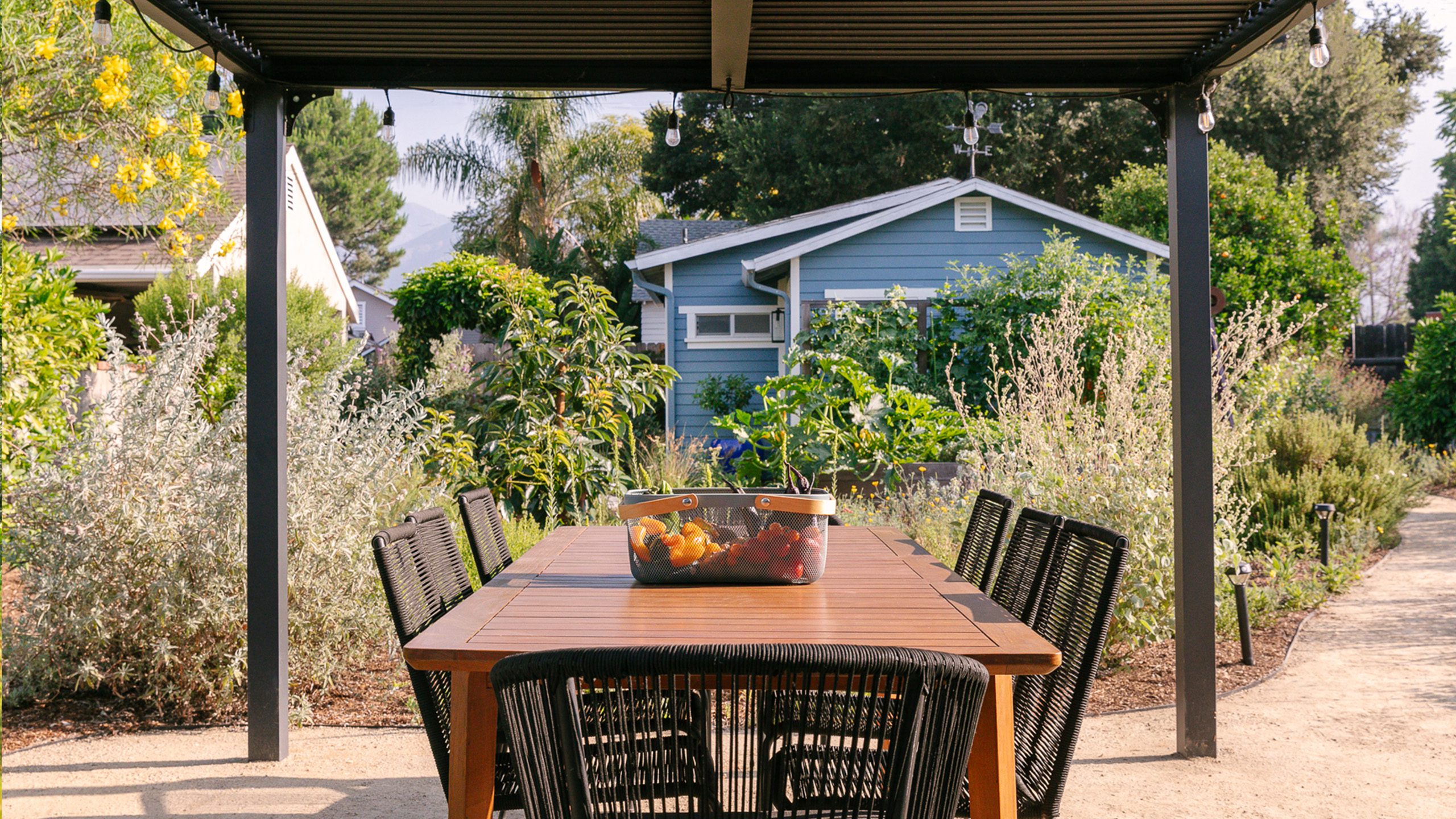 Pergola & outdoor dining table on decomposed granite patio